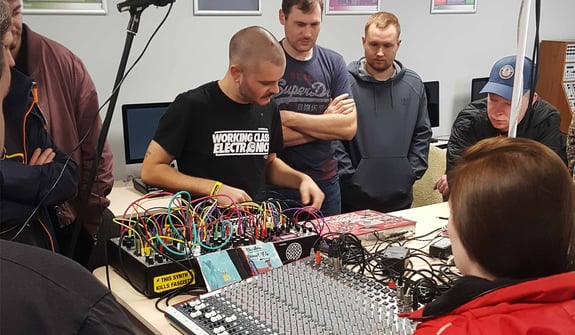 Ben Chilton running a Eurorack workshop for a classroom of students at dBs Plymouth