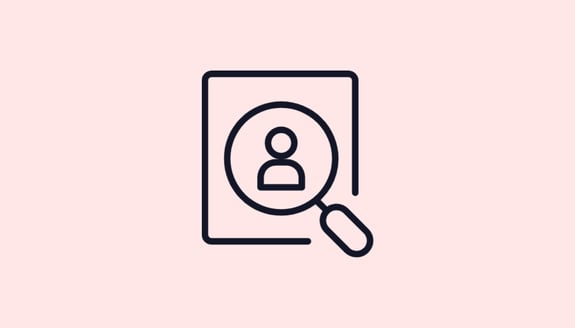 A graphic of a magnifying glass over a CV