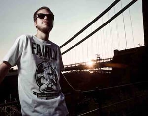 A press shot of Culprate in front of the Clifton Suspension Bridge in Bristol, UK