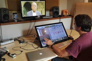 Tom Edwards working on a post-production edit in the Denhams studio