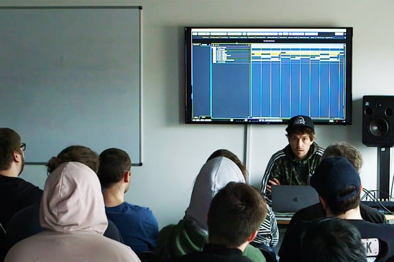 DJ/producer Erb N Dub delivering a track breakdown masterclass to our Plymouth students